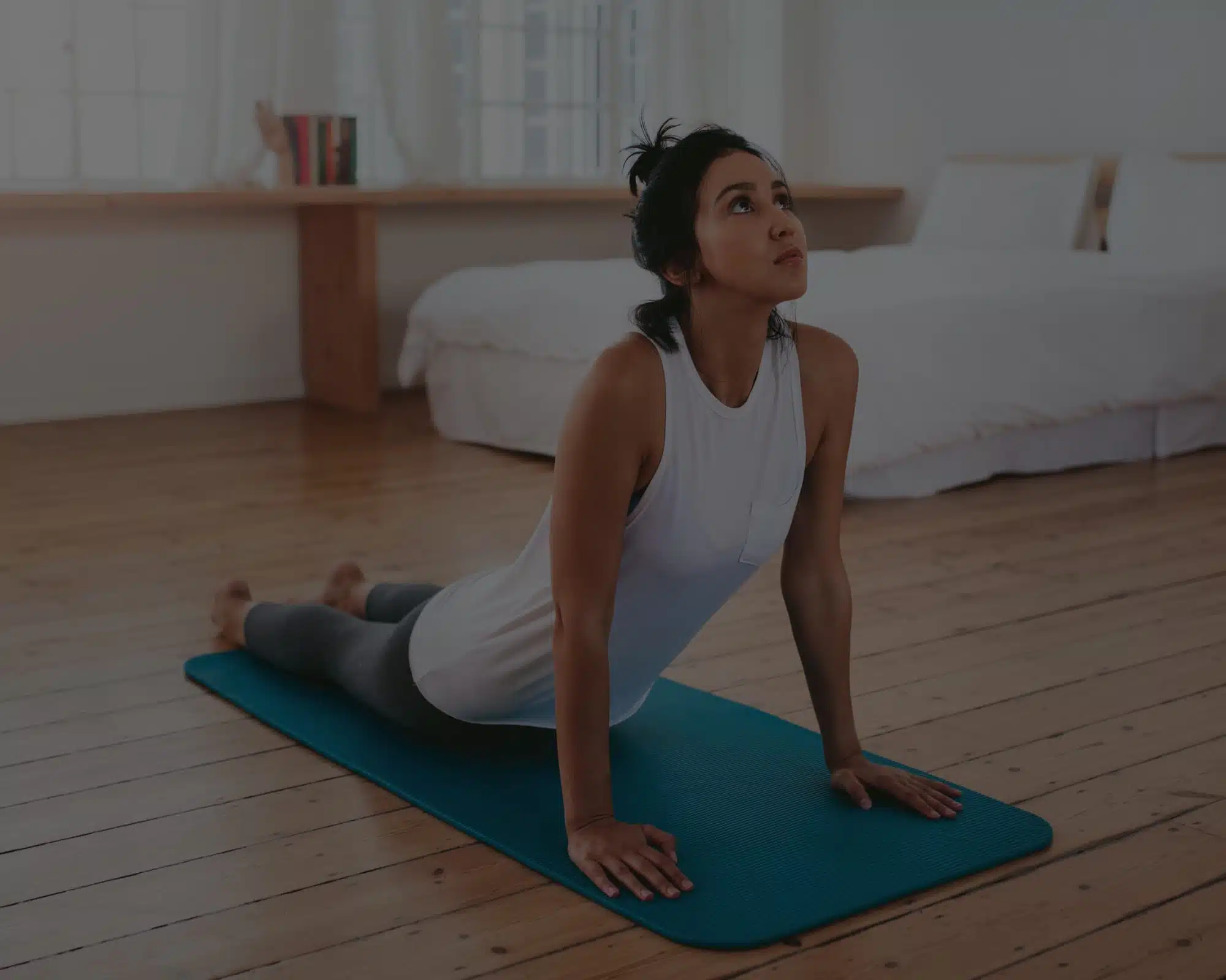 People doing yoga in a yoga studio